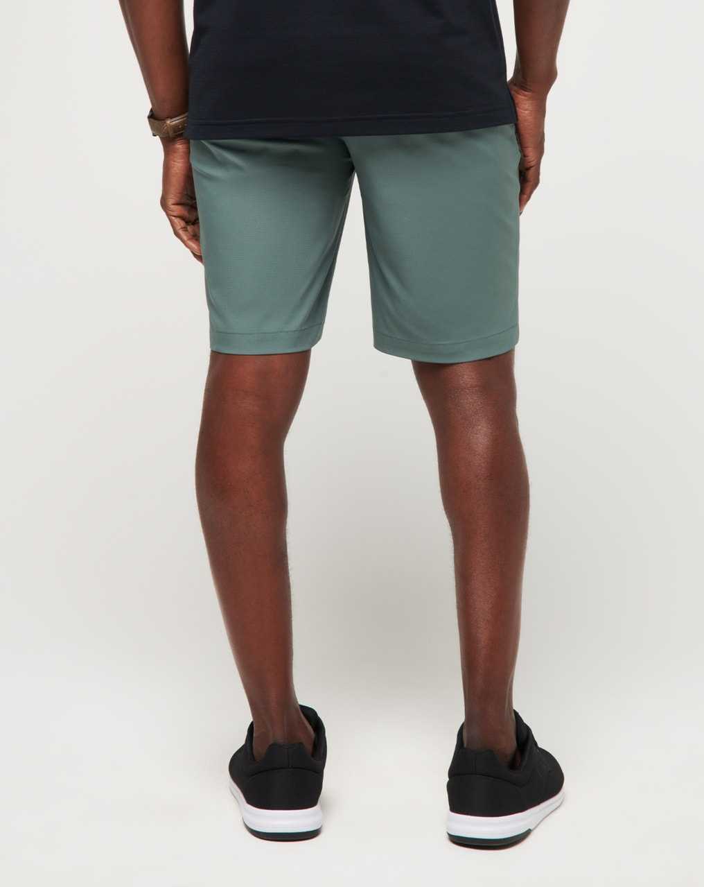 Balsam Green Travis Mathew Wanderlust Short 9in | XSKG50312